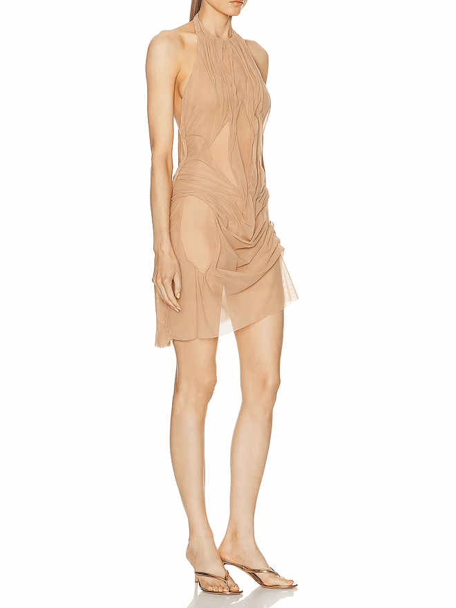 Sheer nude mini dress, wet look texture, model demonstrating fit.