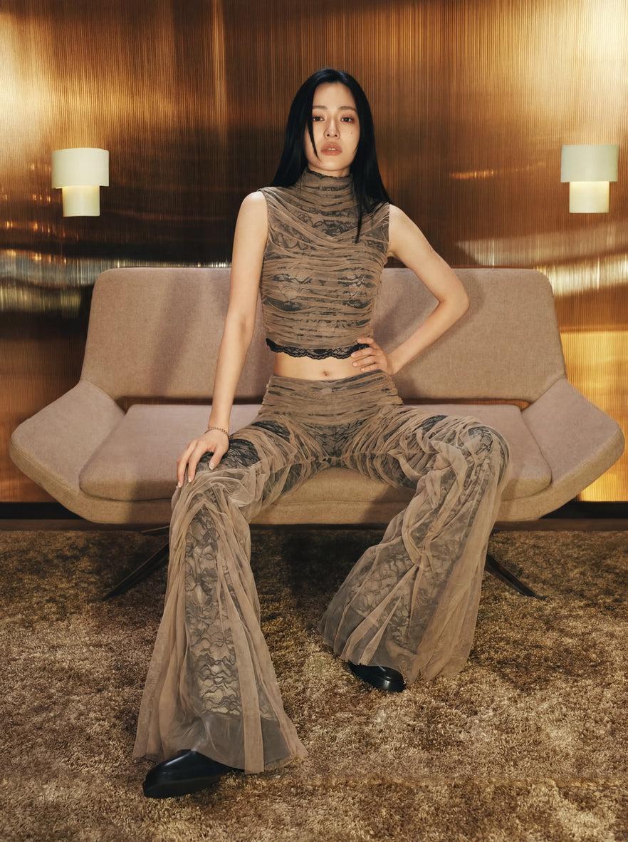 Lookegarment Matching Sets Collection Banner: A high-fashion two-piece ensemble featuring signature handcrafted pleats and a permanent wet-look shimmer.