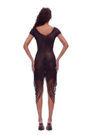 Back view of the black asymmetric sheer midi dress, showing short sleeves, a scooped back neckline and draped fringe.