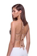 Aurevia halter crop top in Metallic Black, back three-quarter view showing the two back ties.