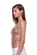 Aurevia halter crop top in Metallic Rose, side view showing the shaped feather-like edges and open back.