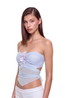 Aveline 3D hand-painted floral tie-back crop top in Pastel Blue, front three-quarter view showing raised floral detail and sheer mesh