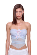 Aveline 3D hand-painted floral tie-back crop top in Pastel Blue, front view showing pastel flowers, gathered bust and pointed hem