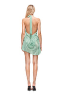 back view of the Bella Metallic Wetlook Halter Mini Dress in mint green, showing its draped silhouette.