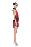 Side view of the Eclipse red and black gradient mini dress, showing the halter neck tie, open side and draped mini hem.