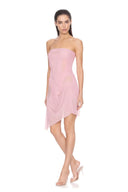 Angled front view of the light pink Eos strapless wet look midi dress, showing gathered draping and an asymmetric hem.