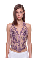 Florielle floral halter top in Aubergine, front view showing raised hand-painted flowers, hand-beaded centers and a shaped hem.