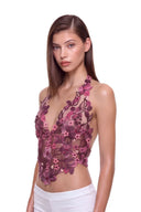Florielle floral halter top in Berry Ombré, three-quarter front view showing raised hand-painted flowers, hand-beaded centers and the shaped hem.