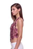 Florielle floral halter top in Berry Ombré, side view showing the floral mesh panels and cropped silhouette.