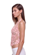 Florielle floral halter top in Blush Pink, side view showing the floral mesh panels and cropped silhouette.