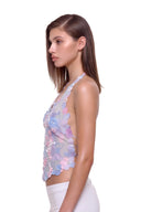 Florielle floral halter top in Pastel Blue, side view showing the floral mesh panels and cropped silhouette.