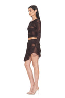 Ione Chocolate Brown mesh two-piece skirt set, side view showing draped crop top and asymmetric mini skirt