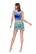 Back view of the Marea Moonlight Gradient two-piece set showing the low draped neckline and curved skirt folds.