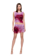 Front view of the Marea Sunset Gradient wetlook skirt set with a sleeveless draped crop top and matching mini skirt.