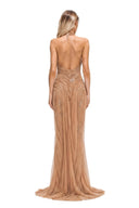 Back view of the Nerissa nude pearl-embroidered wetlook gown with open back and sweeping floor-length train