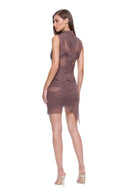 Rear three-quarter view of the Nysa brown skirt set with sheer back panels and an asymmetric hem