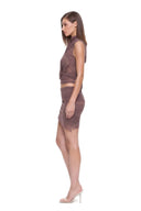 Side view of the Nysa brown high-neck crop top and mini skirt with gathered mesh
