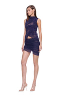 Front-angle view of the Nysa navy two-piece set, showing the sleeveless crop top and draped mini skirt