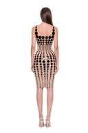 Oria hand-painted dot knee-length dress in Black/Nude, back view showing the scooped back and graduated dot pattern