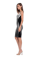 Oria hand-painted dot knee-length dress in White/Black, side view