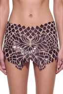 Serica hand-painted mini skirt in Metallic Black, close-up of the front motif and shaped hem