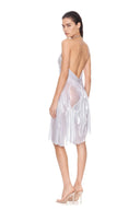 Rear three-quarter view of the metallic silver Silver Moon chain-halter wetlook midi dress, showing the garment silhouette and back detailing.