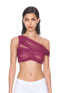 front view of the Thalia Fuchsia One-Sleeve Wet Look Crop Top, with a single shoulder strap, one short off-shoulder sleeve and sheer draping.