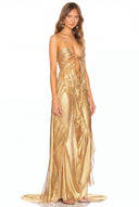 Side view of the Venus metallic gold wetlook gown with sculptural draping and floor-length fishtail train