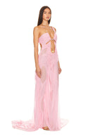 Front three-quarter view of the light pink Venus wet look gown, showing a chain neckline, bodice cutouts and a long draped skirt.