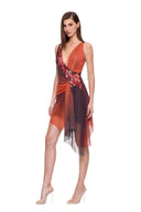 Virelle floral asymmetric mini dress in Orange Ombre, three-quarter front view showing the floral detail and cascading asymmetric hem