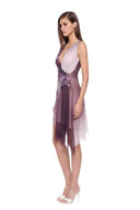 Virelle floral asymmetric mini dress in Plum Ombre, three quarter front view showing the deep V neckline, hand-painted floral detail and cascading hem