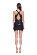 Zyra hand-painted dragon-scale V-neck mini dress in Black, back view showing the crossed straps and open back